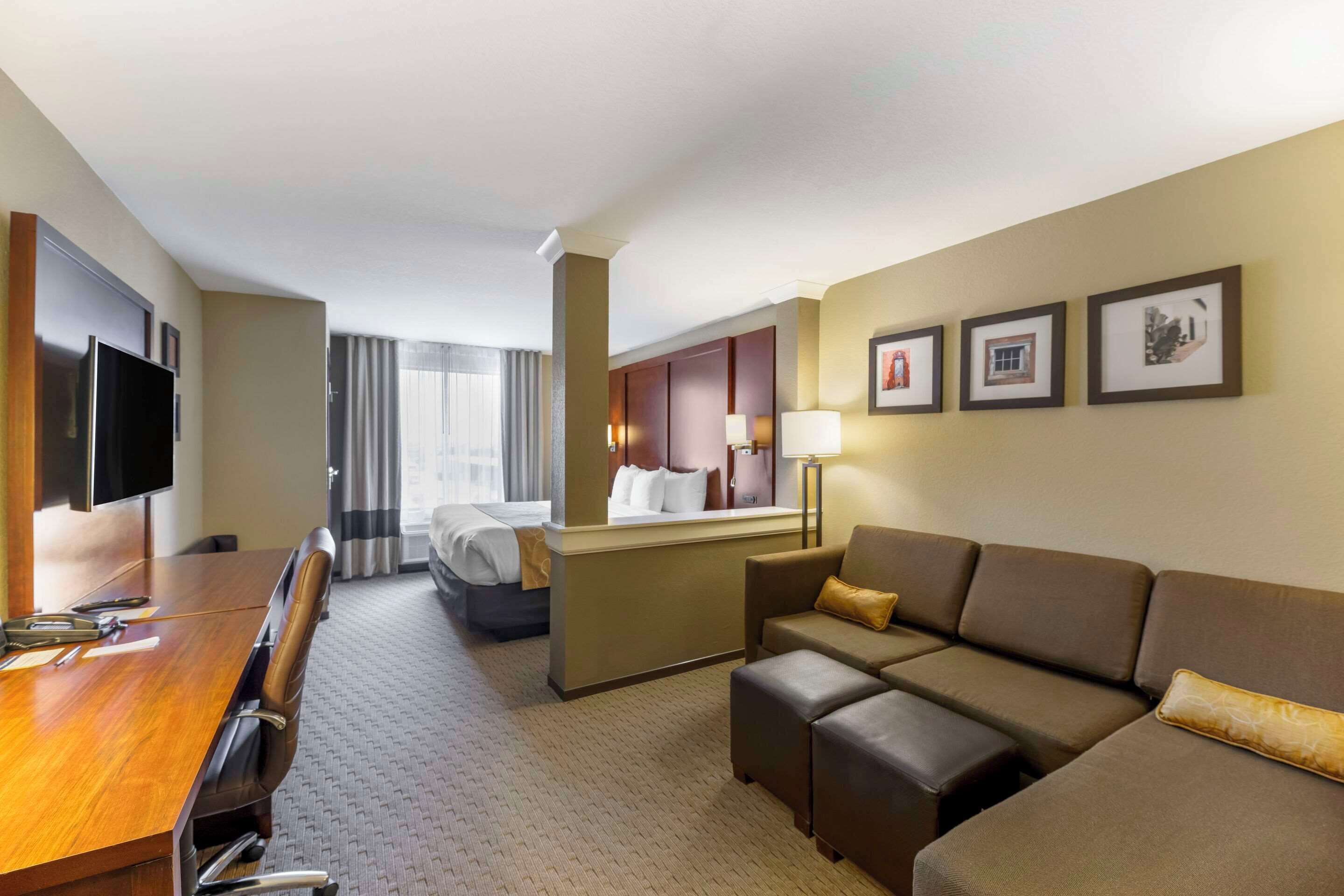 suite, 1 king bed with sofa bed, non smoking | pillow-top beds, desk, iron/ironing board, free wifi