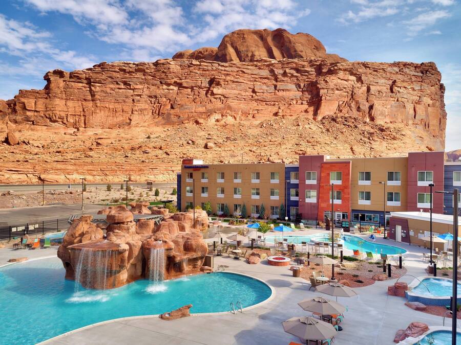 Outdoor pool, open 8:00 AM to 10:00 PM, pool umbrellas, pool loungers