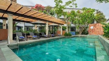 Outdoor pool, open 9:00 AM to 10:00 PM, pool umbrellas, sun loungers