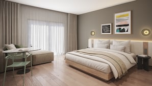 A modern bedroom with a bed, bedside tables, a chair, and a table.