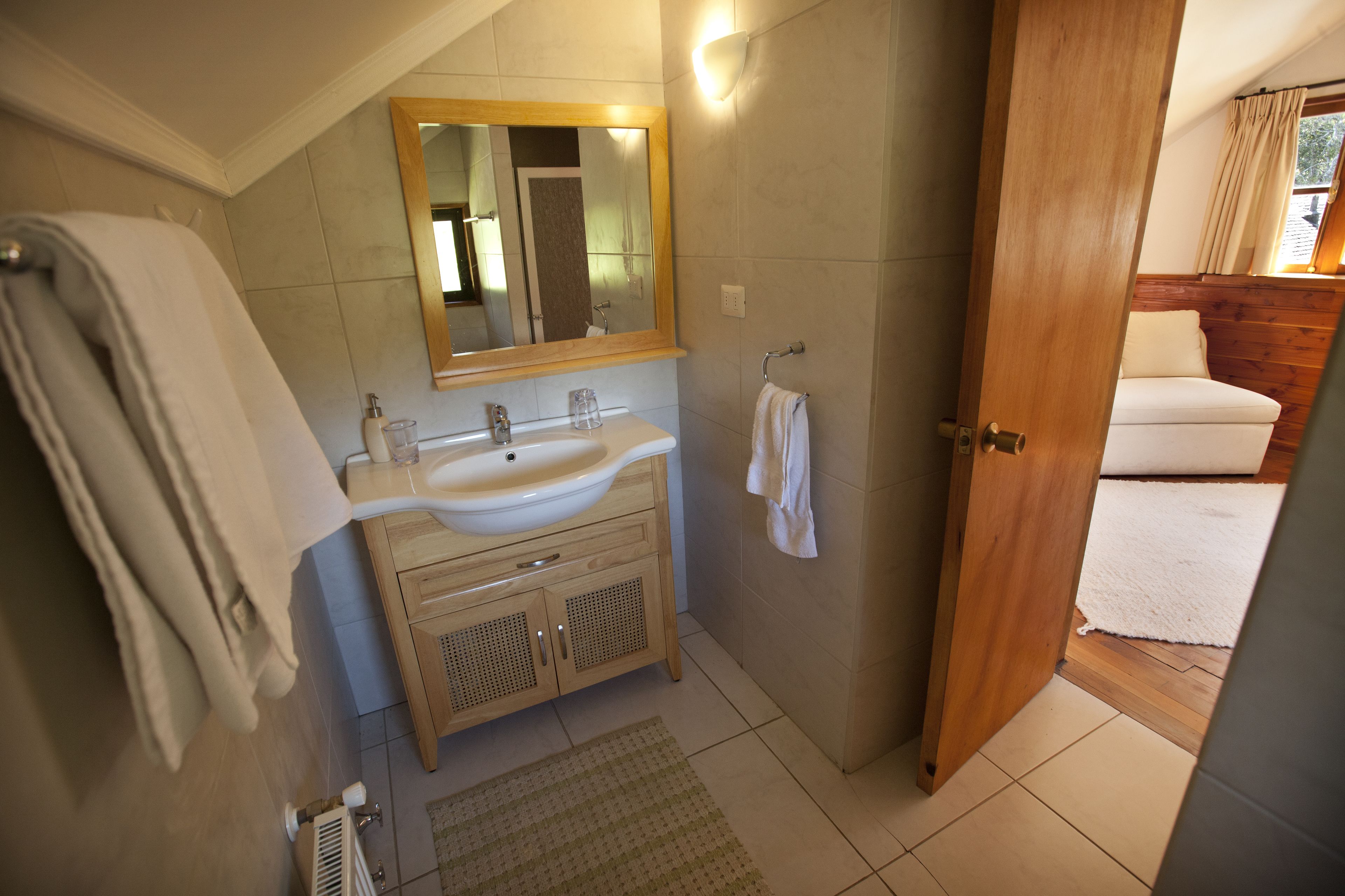 loft | bathroom | hair dryer, towels, soap, shampoo