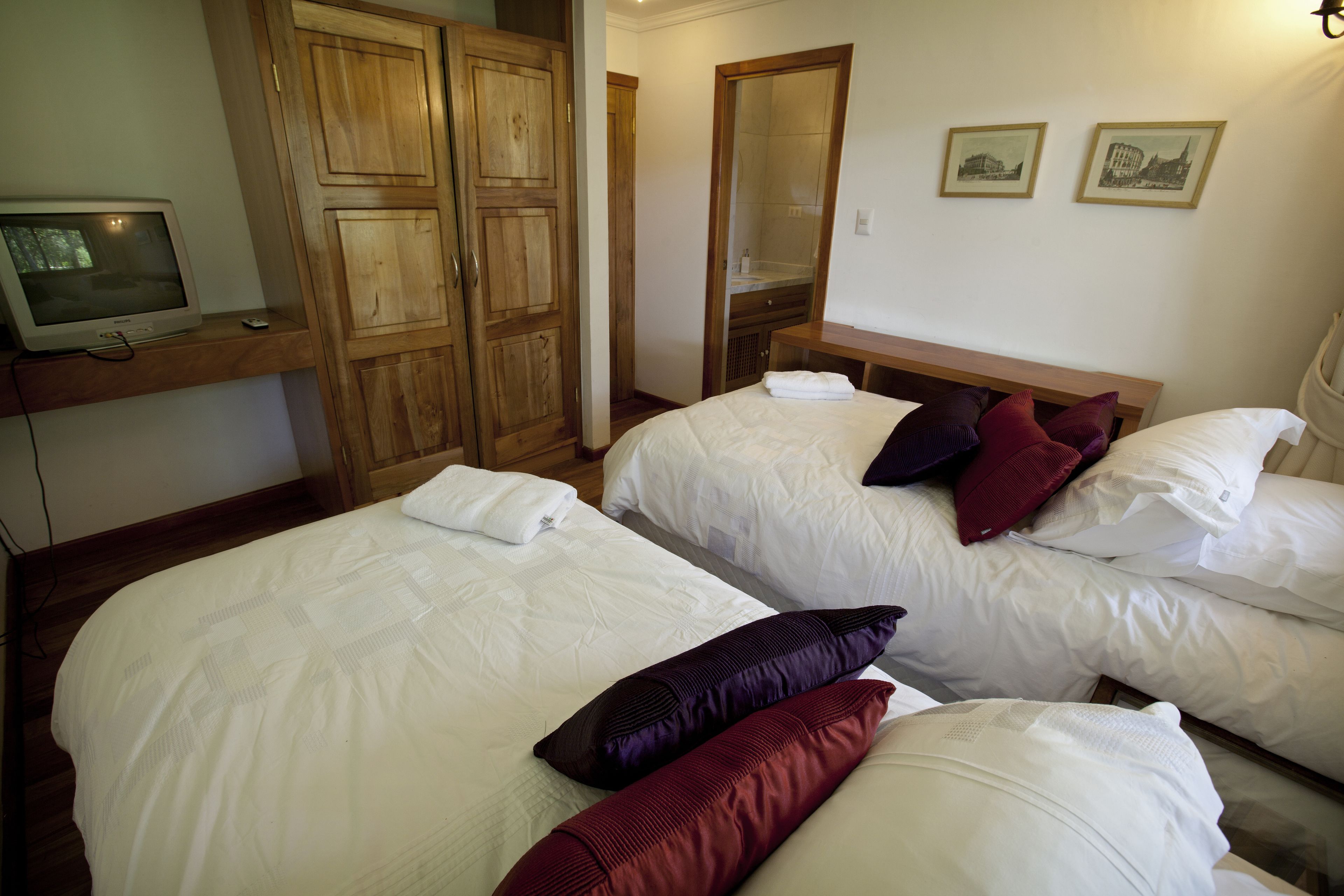 Premium bedding, down duvets, blackout curtains, free cots/infant beds