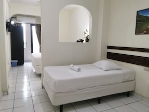 Habitación familiar | Ropa de cama de alta calidad y decoración individual