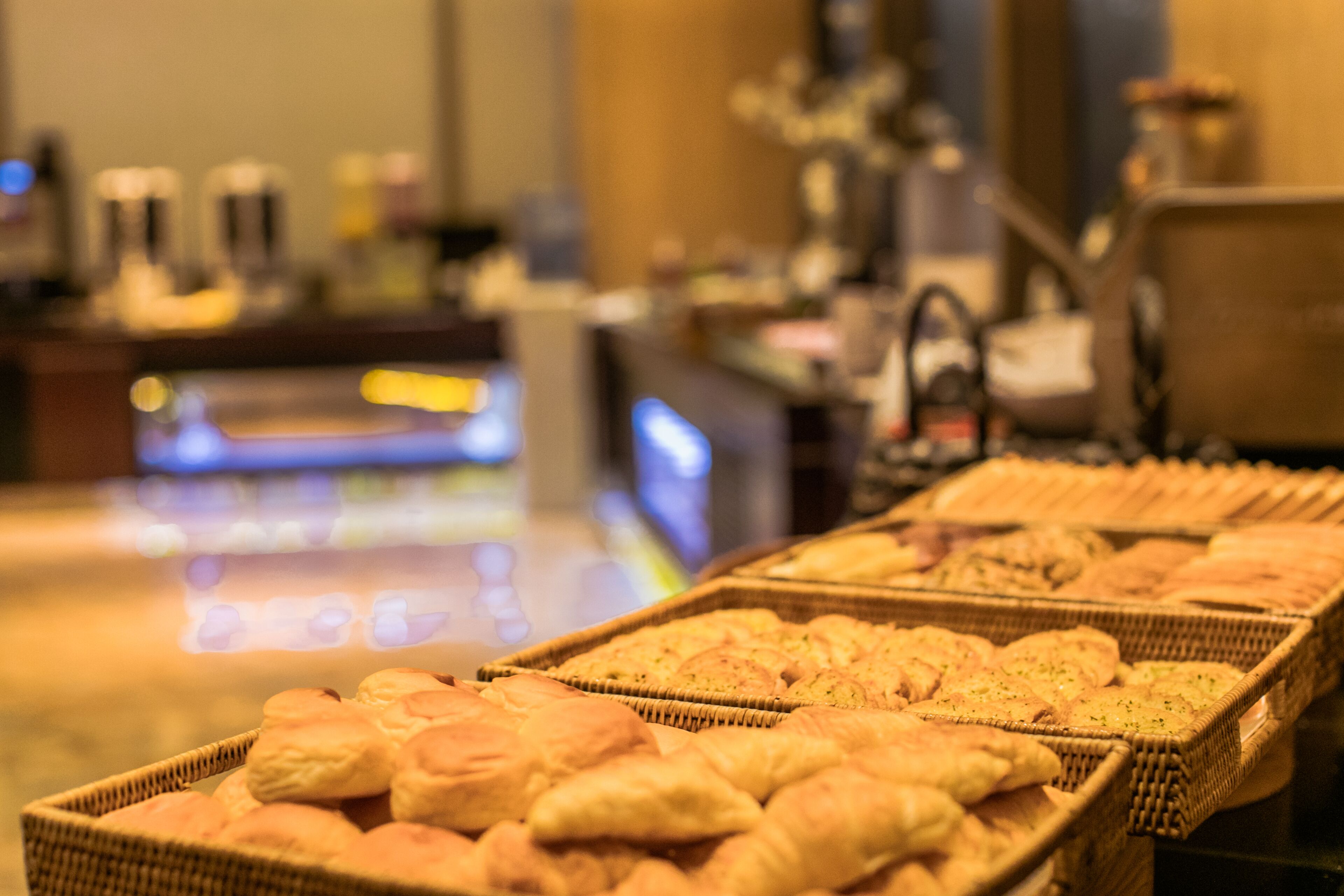 A buffet with various baked goods.