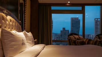 Park Suite | Down comforters, individually furnished, desk, blackout drapes