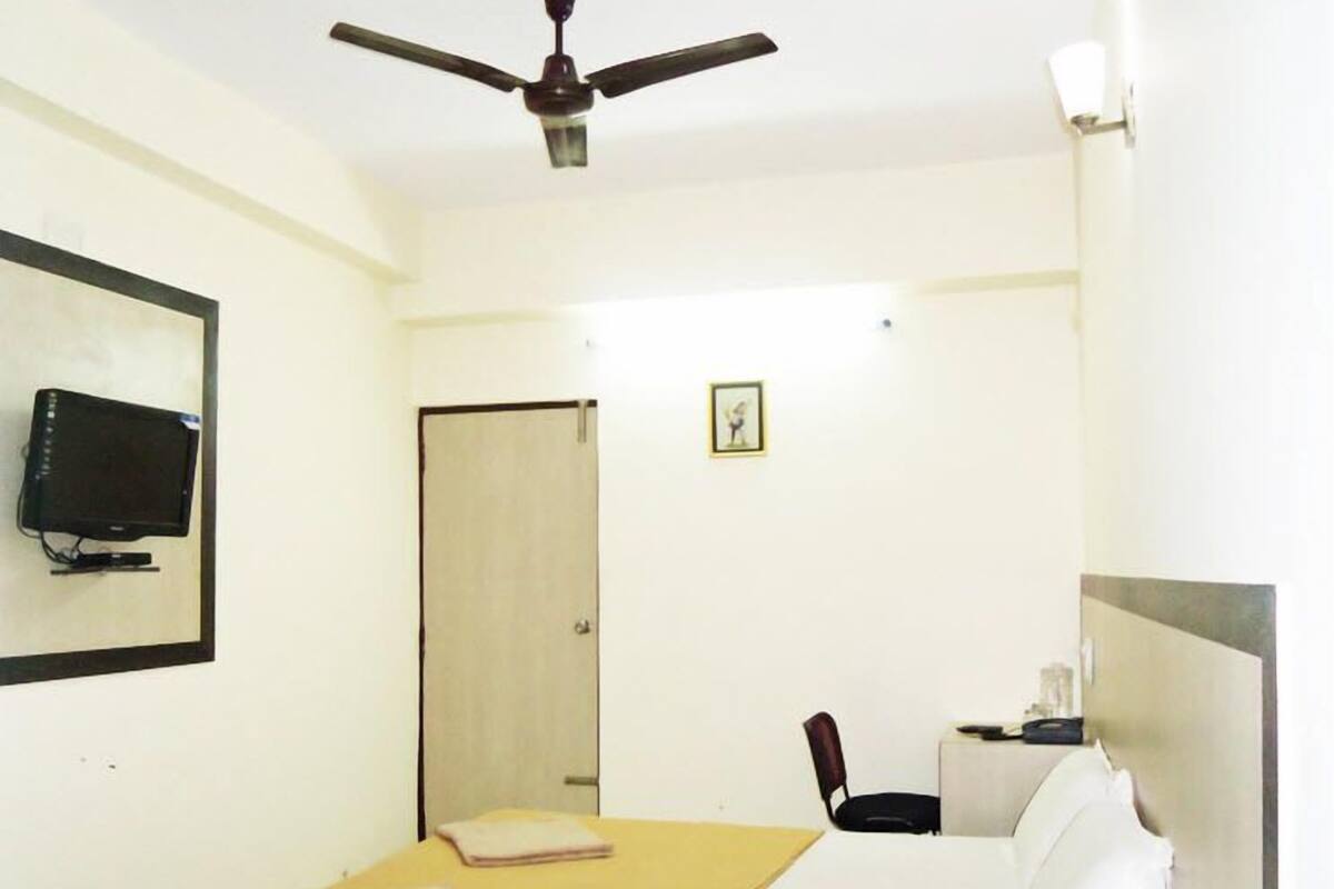 Desk, blackout curtains, iron/ironing board, WiFi