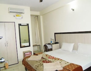 Standard Room | Desk, blackout curtains, iron/ironing board, WiFi