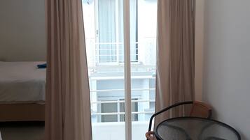 Habitación Deluxe | Minibar, caja de seguridad en la habitación, escritorio y wifi gratis