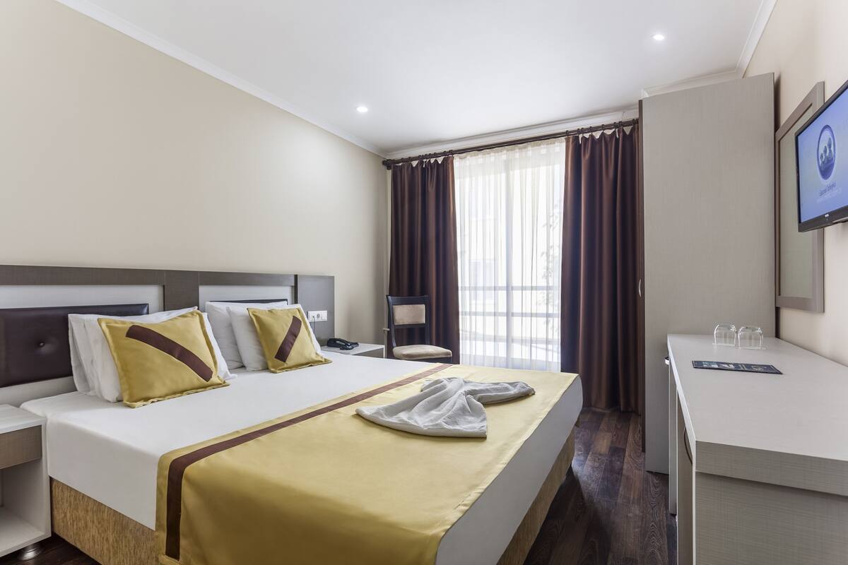 Ropa de cama de alta calidad y minibar 