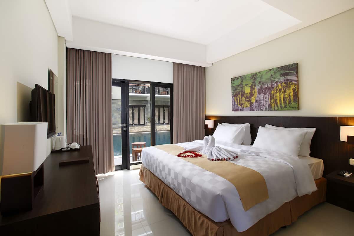 Deluxe tweepersoonskamer, 1 kingsize bed, aan het zwembad | Kameruitzicht