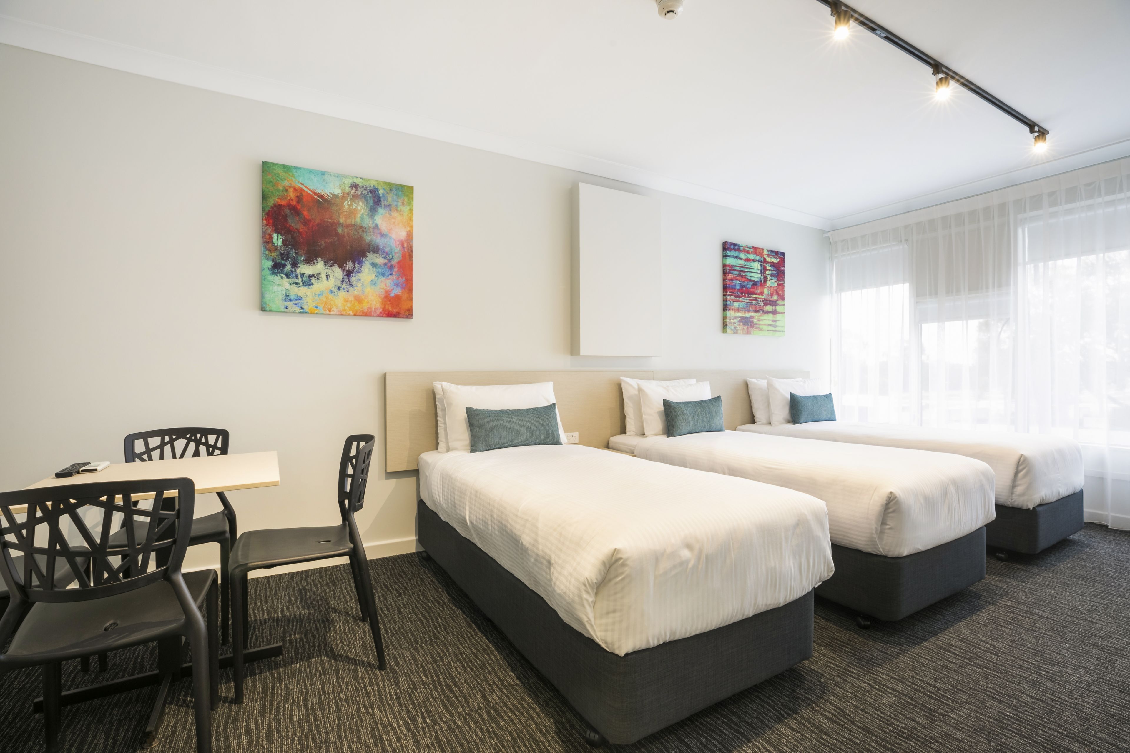 family room - one king & three single beds | desk, iron/ironing board, free wifi, bed sheets