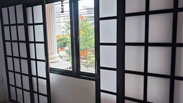 Sumo Village | Individually decorated, individually furnished, desk, rollaway beds