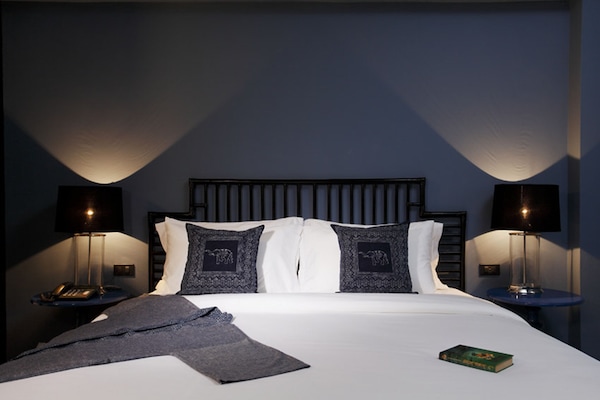 Deluxe Double Room | Minibar, in-room safe, blackout drapes, free WiFi