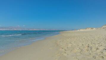 Beach nearby, sun-loungers, beach umbrellas