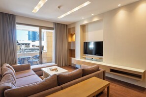 Executive Suite (Deluxe) | Living area | LCD TV, DVD player - Saifi Suites Hotel (Beirut)