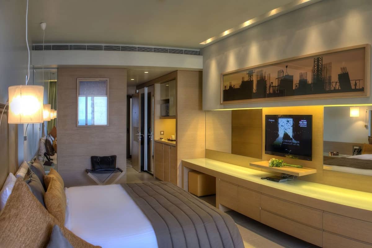 Sábanas italianas Frette, ropa de cama de alta calidad y minibar