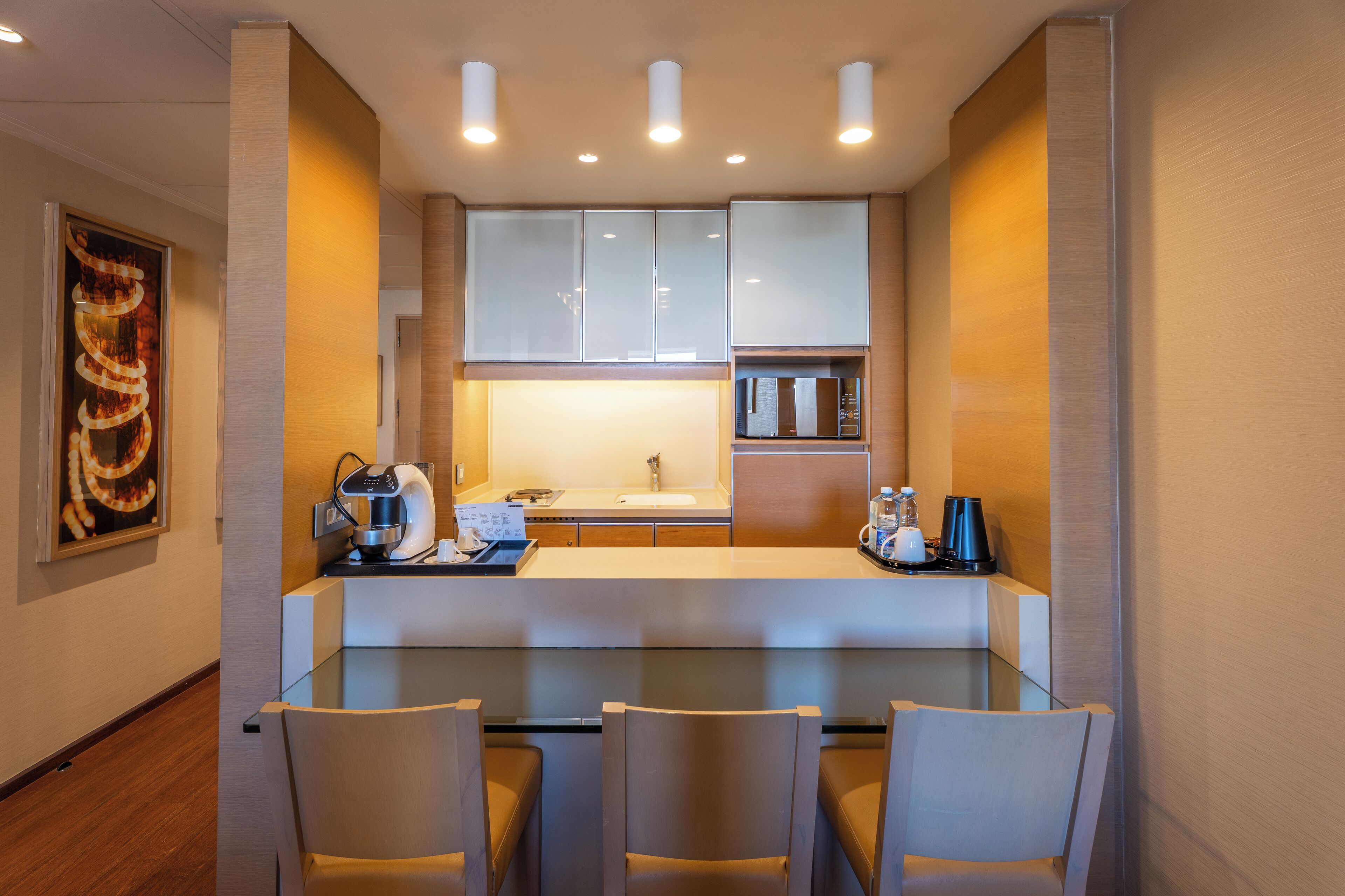 microwave, coffee/tea maker, cookware/dishes/utensils