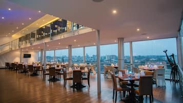 Breakfast, lunch served; local and international cuisine, pool views
