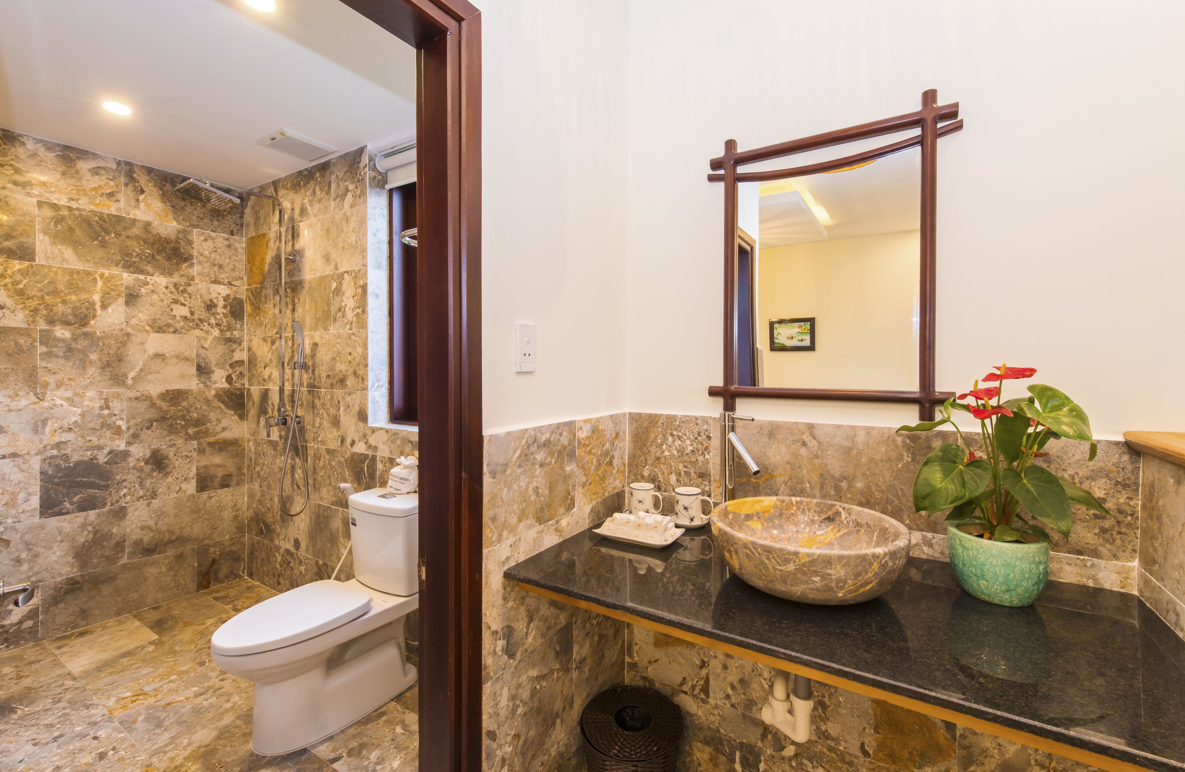 two bebroom suite | bathroom | shower, free toiletries, hair dryer, slippers