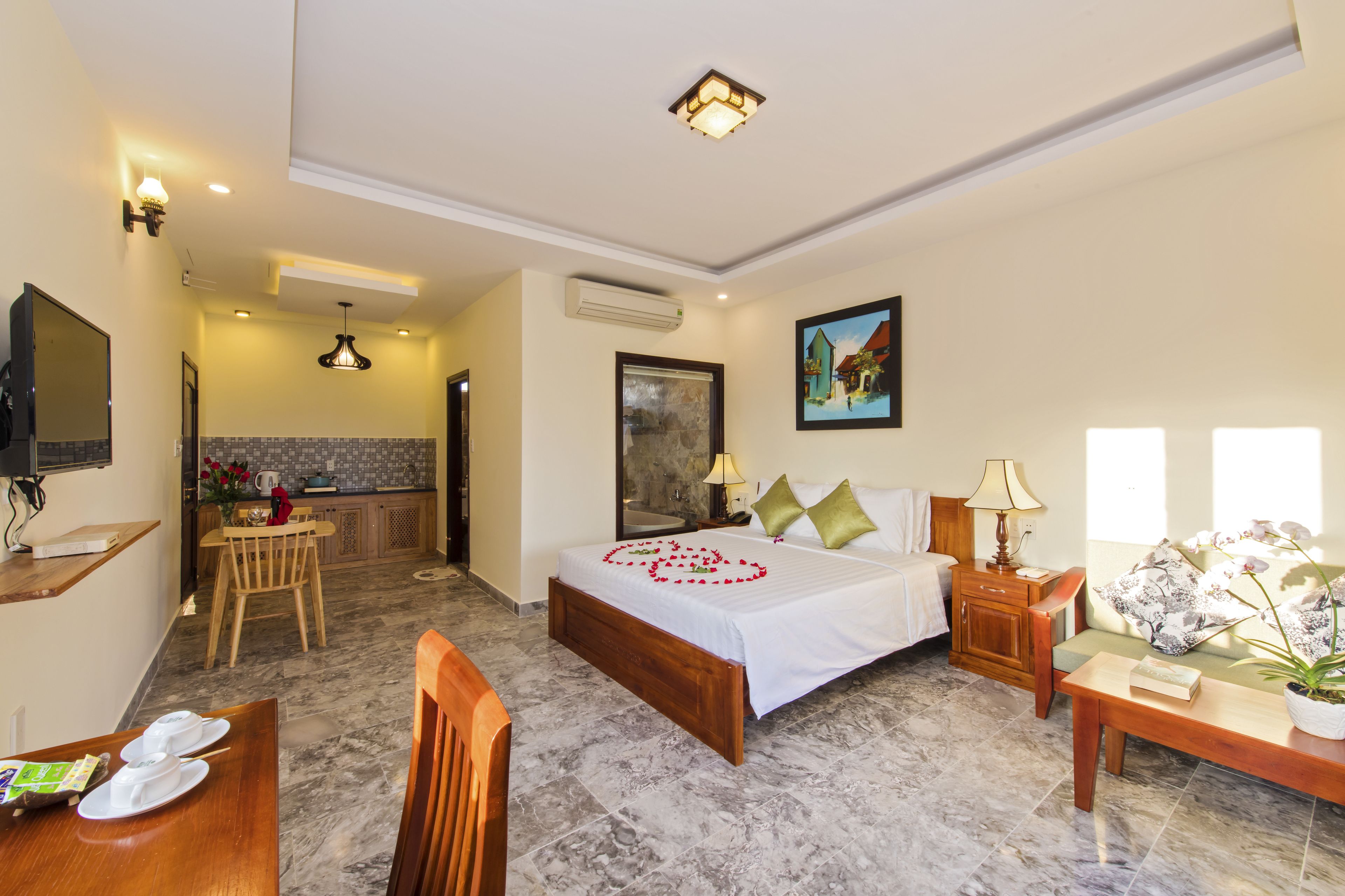 suite with pool view | living area | lcd tv