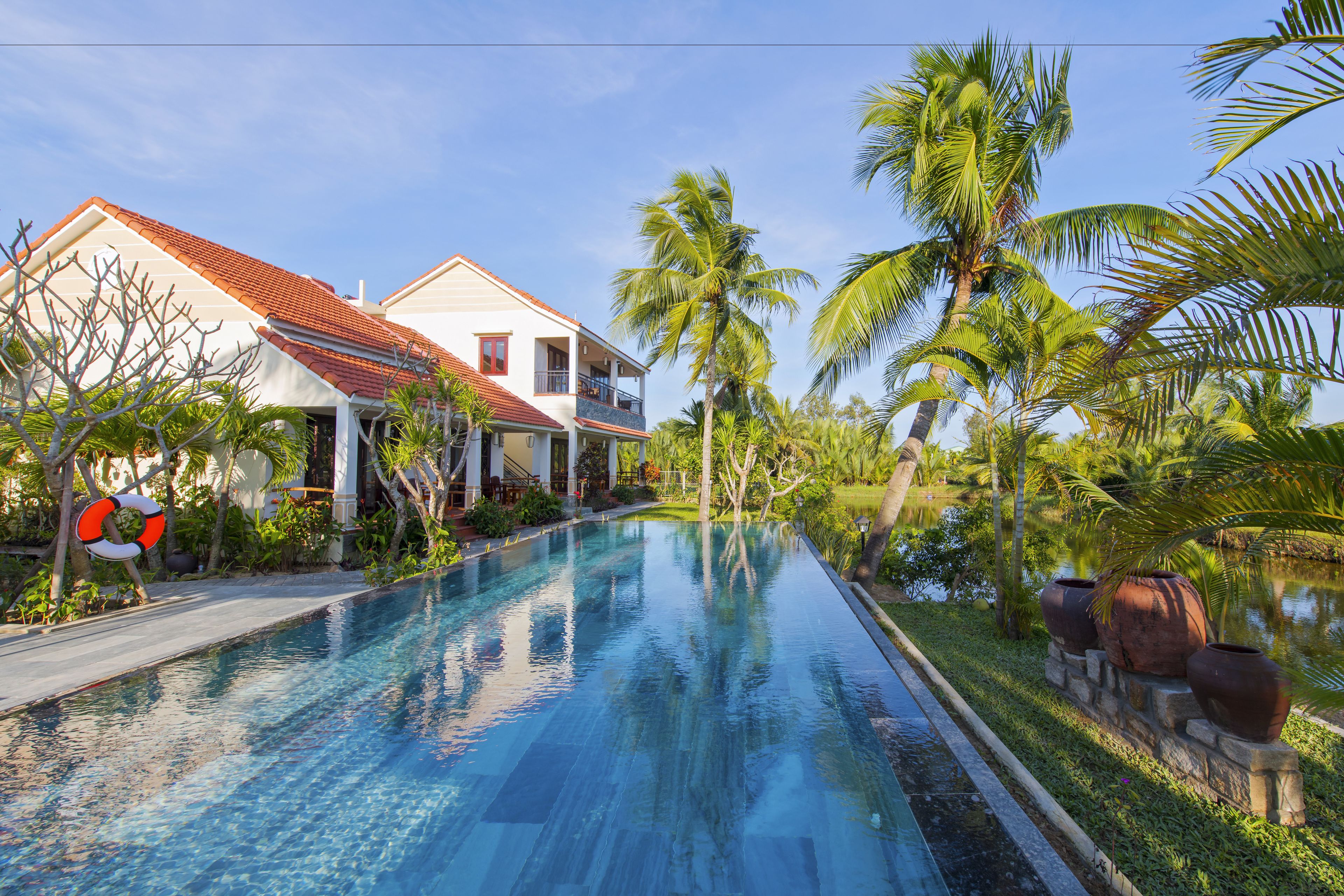 outdoor pool, an infinity pool, pool loungers