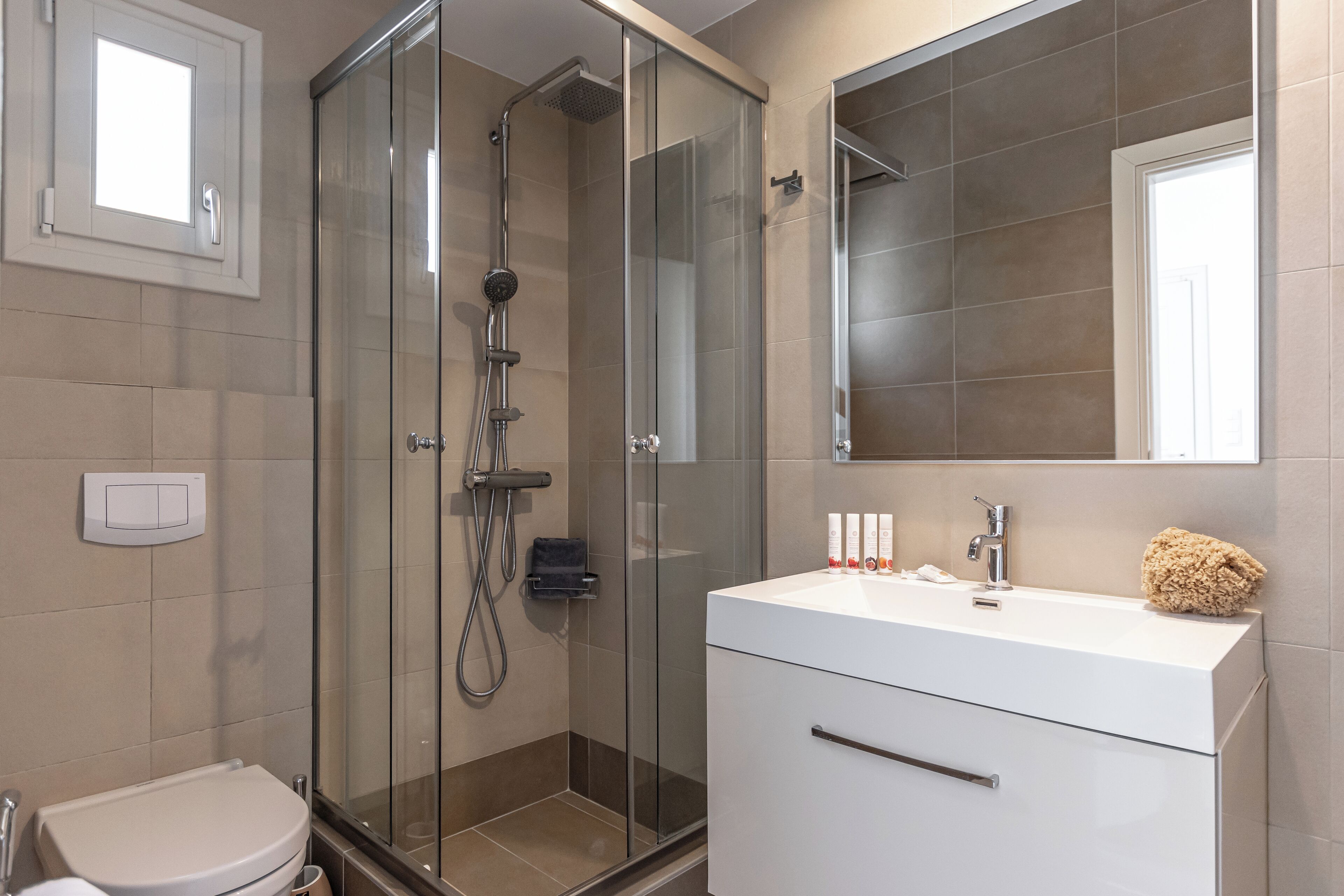 orkos beach villa with hot tub | bathroom | shower, free toiletries, hair dryer, towels