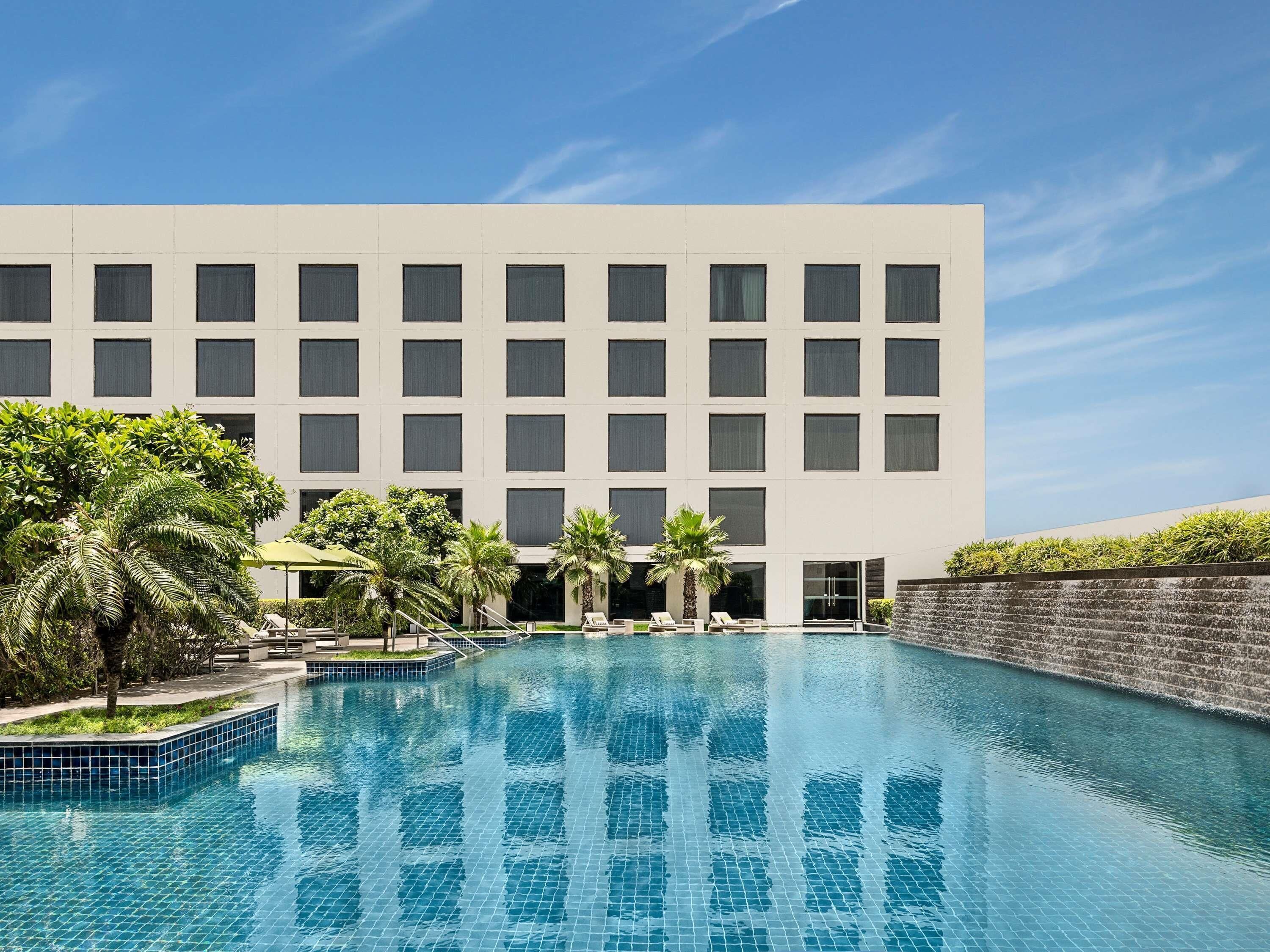 Outdoor pool, pool umbrellas, pool loungers