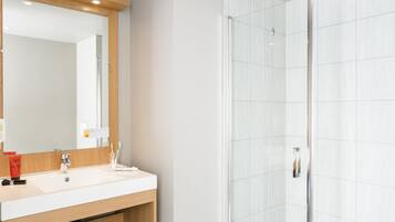 Shower, hydromassage showerhead, eco-friendly toiletries, hair dryer