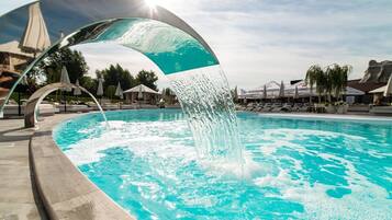 Indoor pool, outdoor pool, pool umbrellas, sun loungers