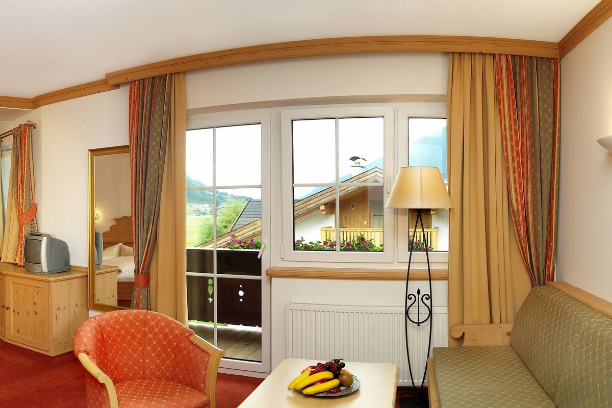 deluxe double room (serles) | premium bedding, down duvets, in-room safe, free rollaway beds