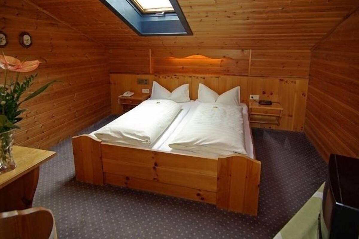 premium bedding, down duvets, in-room safe, free rollaway beds