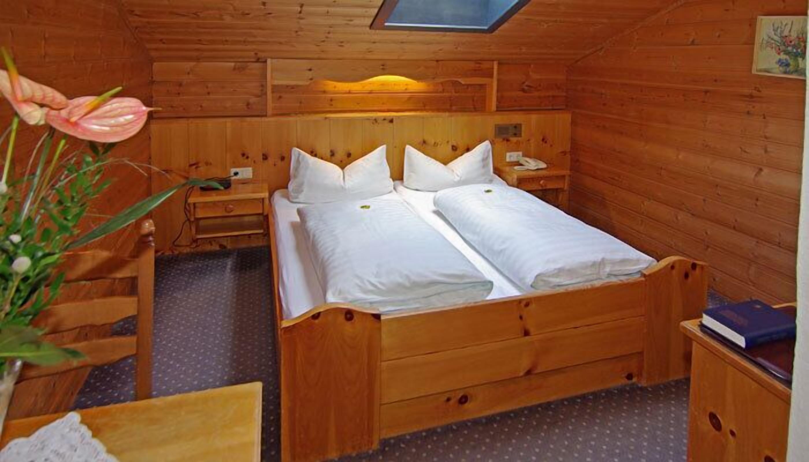 premium bedding, down duvets, in-room safe, free rollaway beds