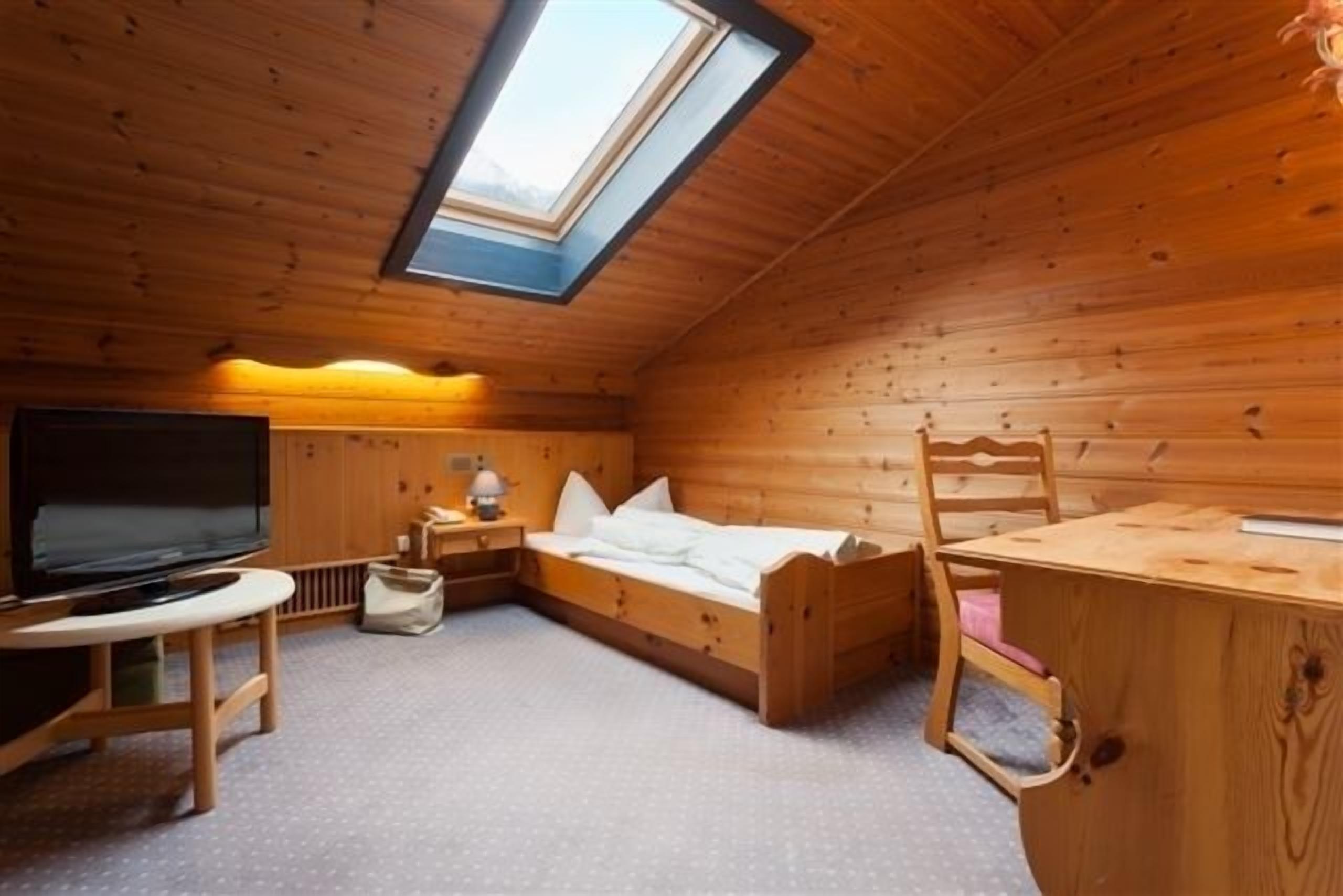 premium bedding, down duvets, in-room safe, free rollaway beds