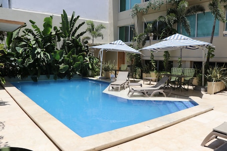 Outdoor pool, sun loungers