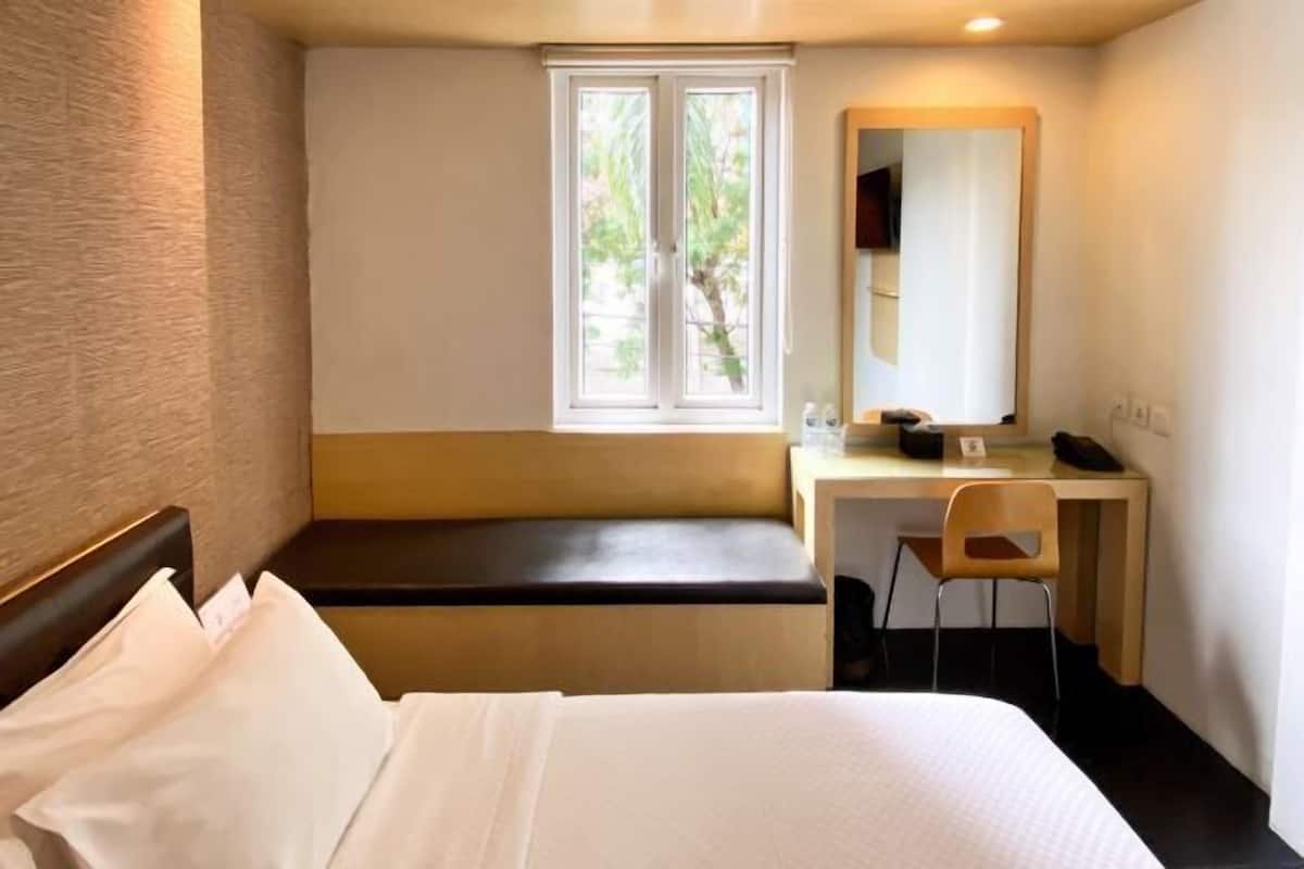 Premium bedding, down comforters, pillowtop beds, in-room safe