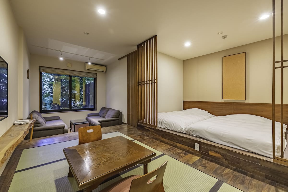 japanese western style room with living room and private open-air bath, non smoking (annex building) | 1 bedroom, in-room safe, free wifi, bed sheets