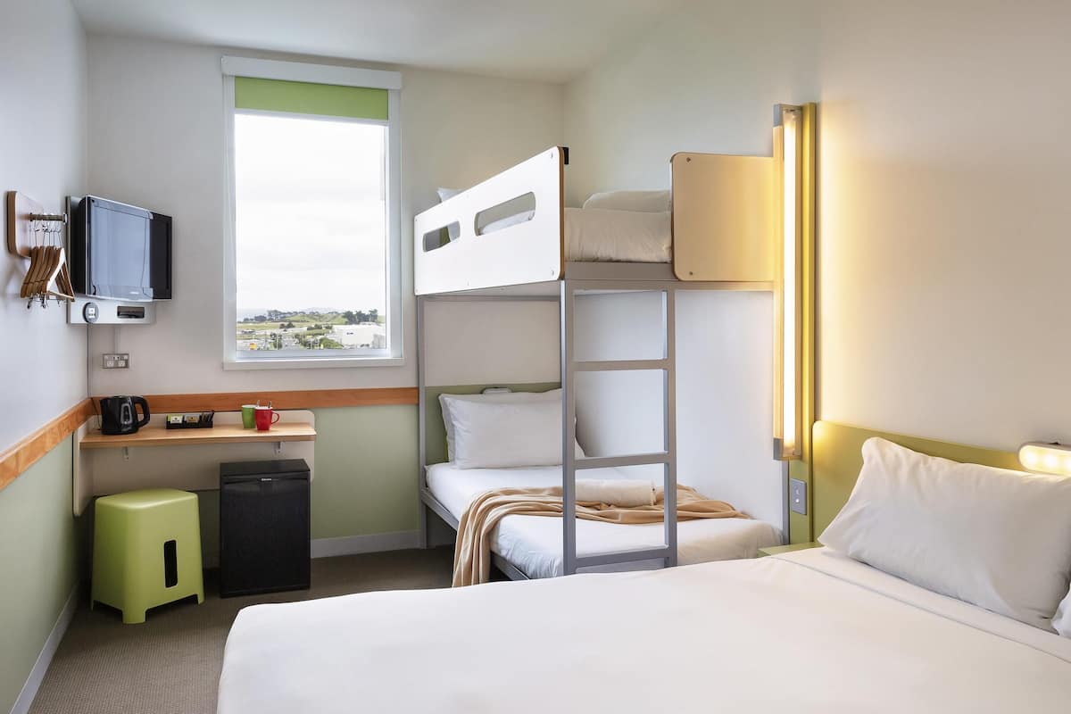 Family Room, Multiple Beds | Desk, blackout drapes, iron/ironing board, free WiFi
