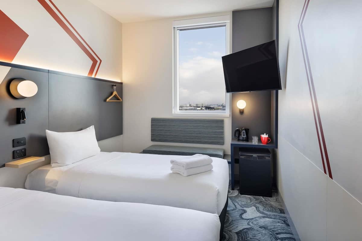 Desk, blackout curtains, iron/ironing board (on request), free WiFi