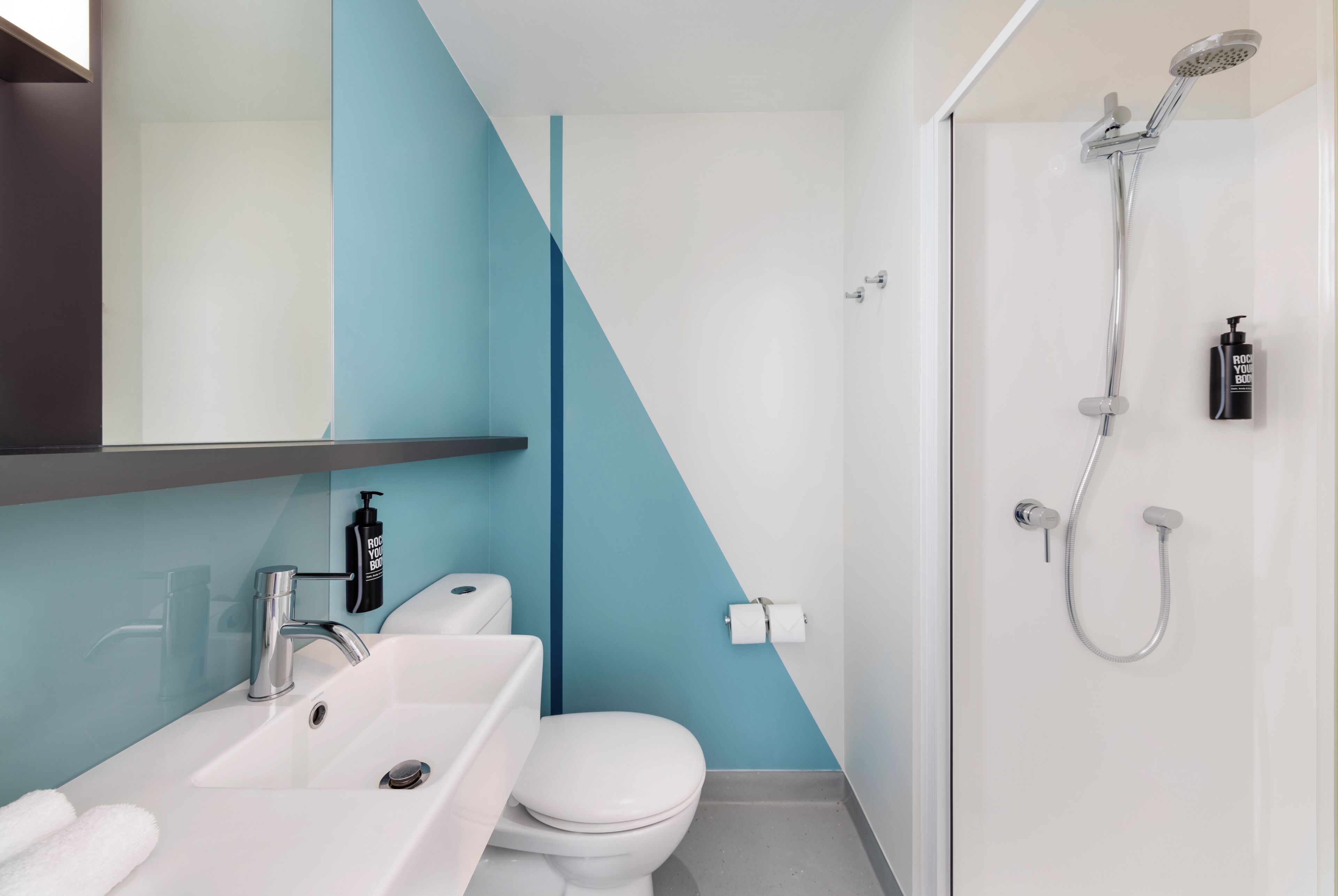 Shower, eco-friendly toiletries, hair dryer, towels