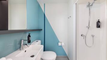 Shower, eco-friendly toiletries, hair dryer, towels