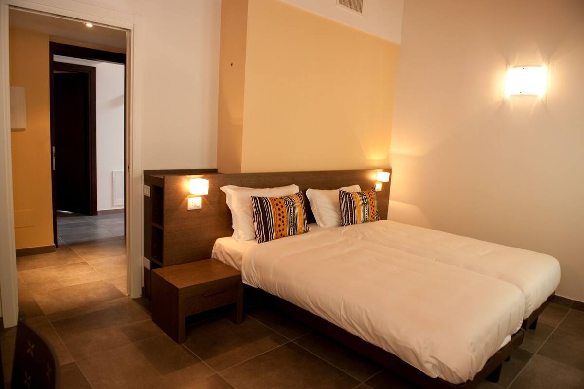 Quadruple Room | Minibar, in-room safe, desk, free WiFi
