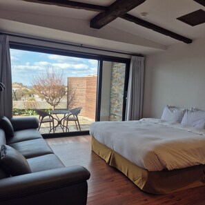 Deluxe Twin kamer, uitzicht op oceaan | Donzen dekbedden, gratis wifi