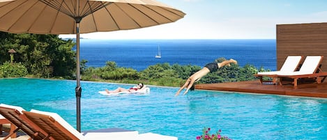 Seasonal outdoor pool, pool umbrellas, pool loungers