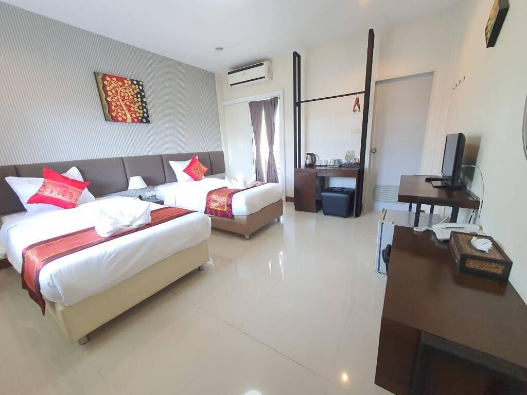 Habitación superior con 2 camas individuales | Ropa de cama de alta calidad, minibar, camas extra y wifi gratis 