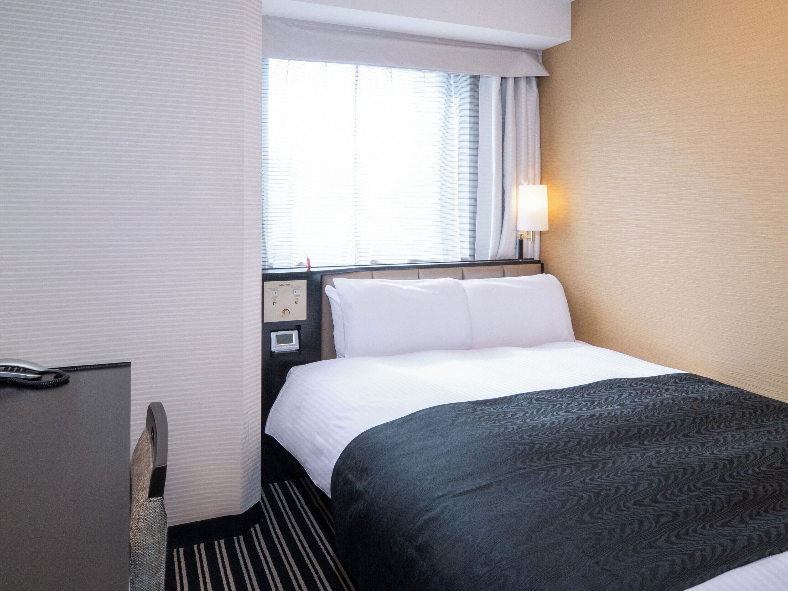 Premium bedding, down duvets, desk, laptop workspace