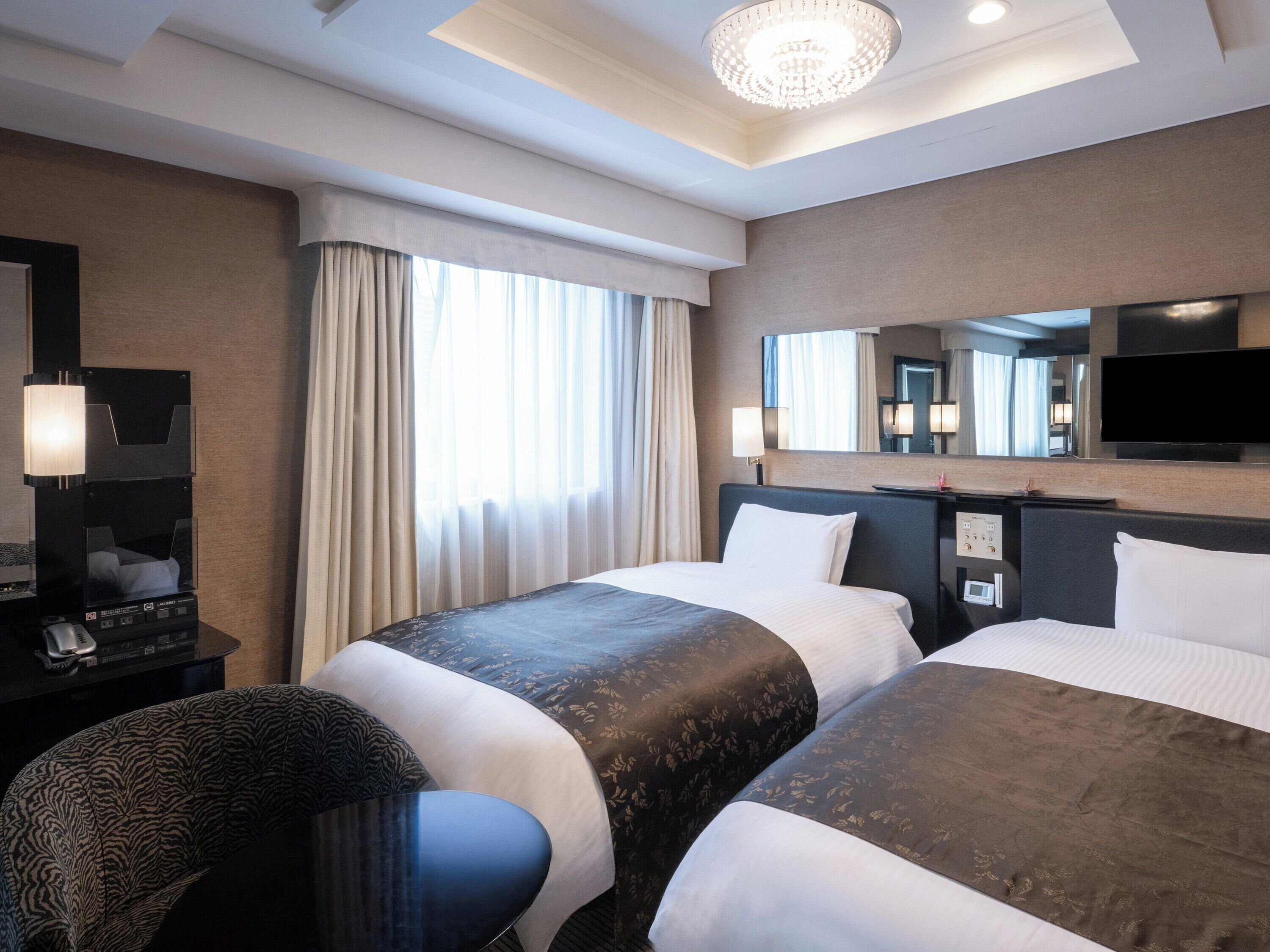 Premium bedding, down duvets, desk, laptop workspace