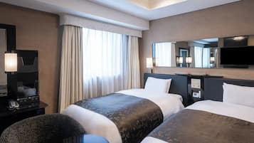 Deluxe Twin kamer, niet-roken | Een bureau, een laptopwerkplek, verduisterende gordijnen, gratis wifi