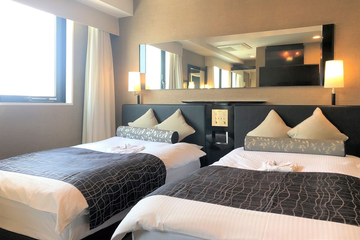 Chambre Deluxe avec lits jumeaux, non-fumeurs | Literie de qualité supérieure, couette en duvet d'oie, bureau
