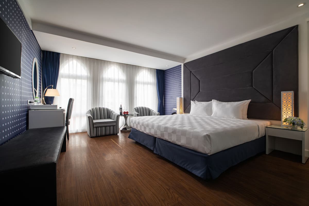 Roba de llit d'alta qualitat, minibar i caixa forta a l'habitació 
