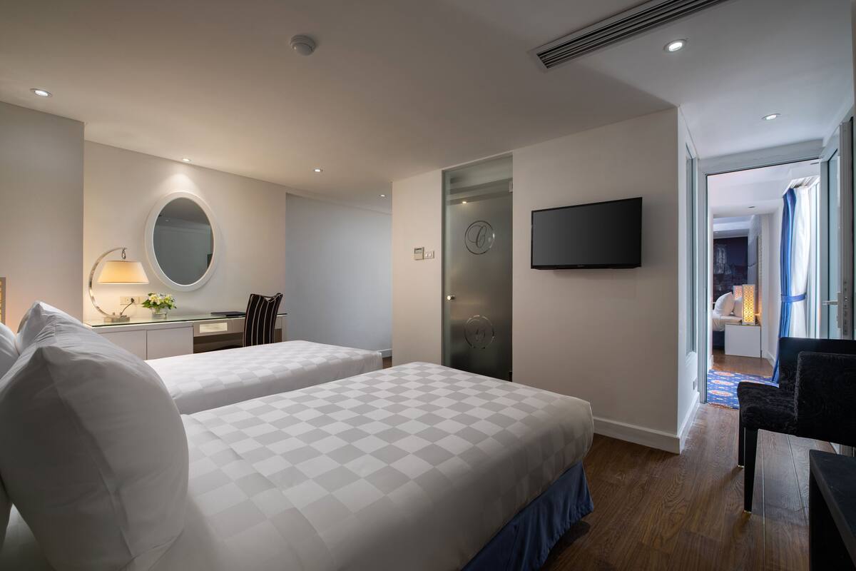 Roba de llit d'alta qualitat, minibar i caixa forta a l'habitació 